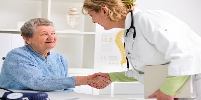 20921534 - medical doctor shaking hands to happy senior patient